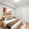 Bedroom with picture on wall